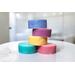 Pastel conditioner bars stacked neatly, eco-friendly and plastic-free. Ideal for all hair types and sustainable hair care routines
